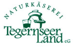 Logo der Naturkäserei Tegernseer Land, die für regionale Käseprodukte und traditionelle Herstellung bekannt ist.
